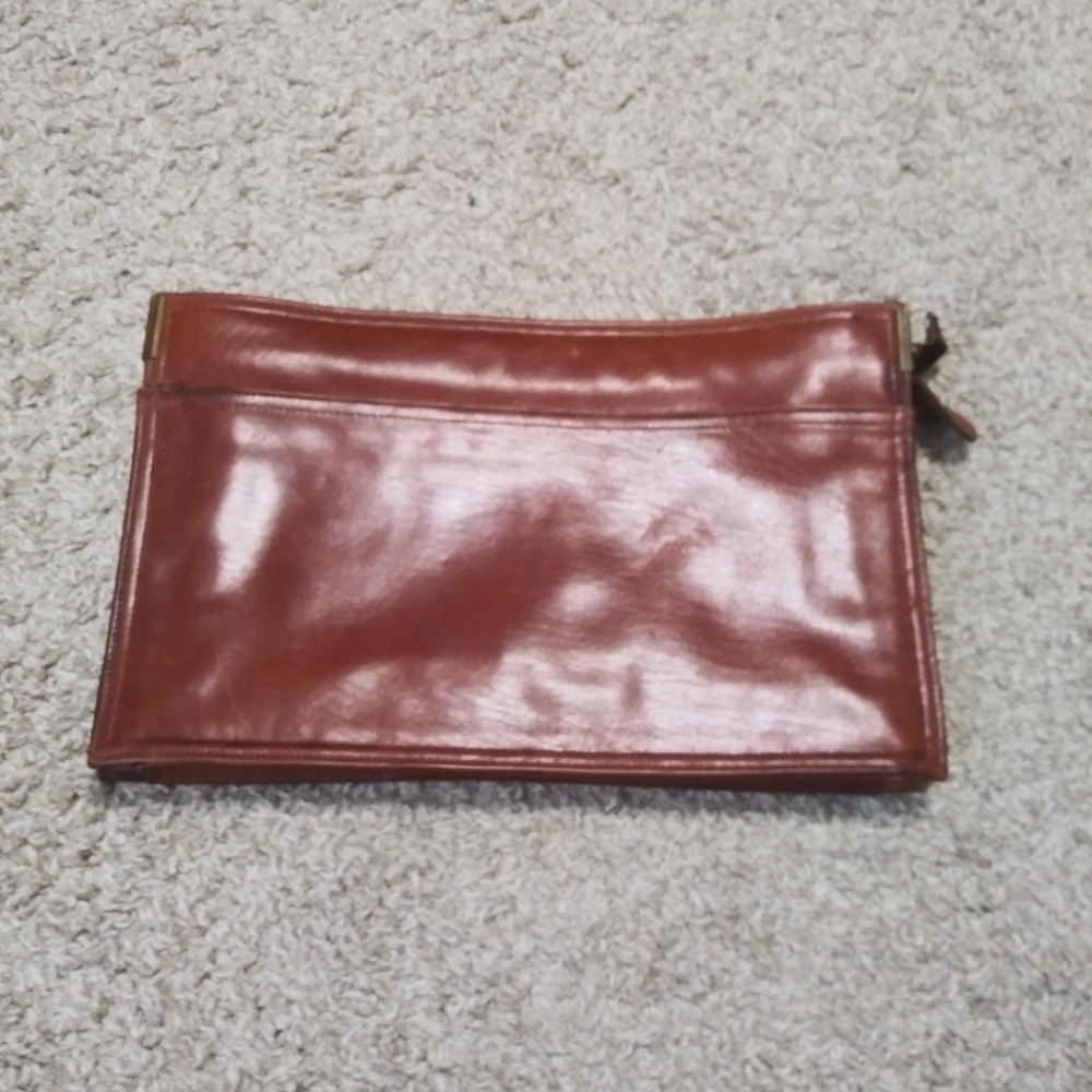 Leather clutch with side pocket